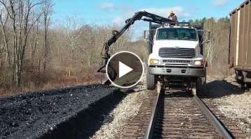 Cleaning Up a Huge Coal Spill on the Railroad Track - Hulcher in for the Rescue